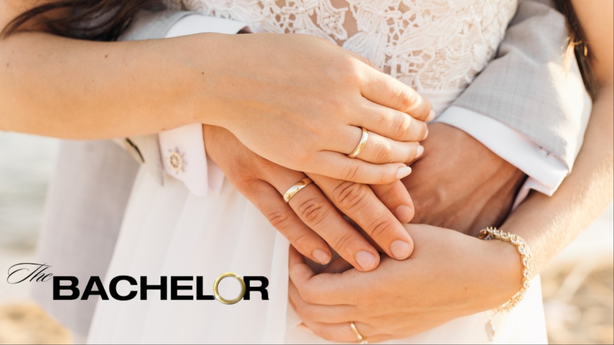 A bride and groom's hands.