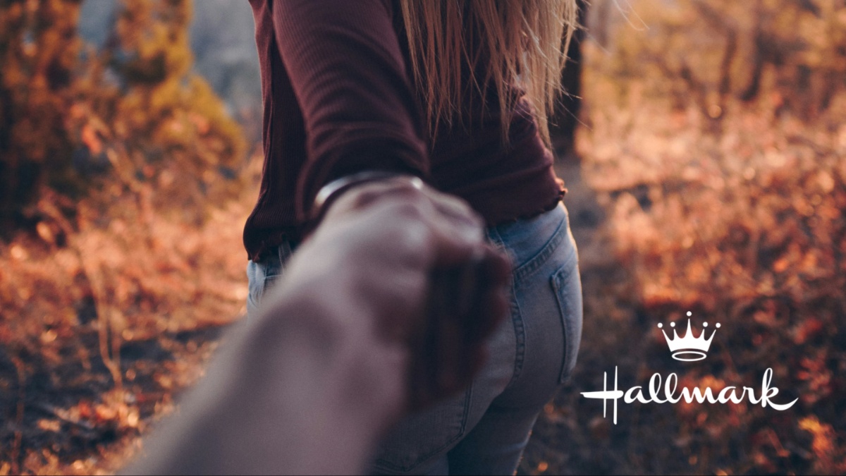 A man and a woman holding hands.