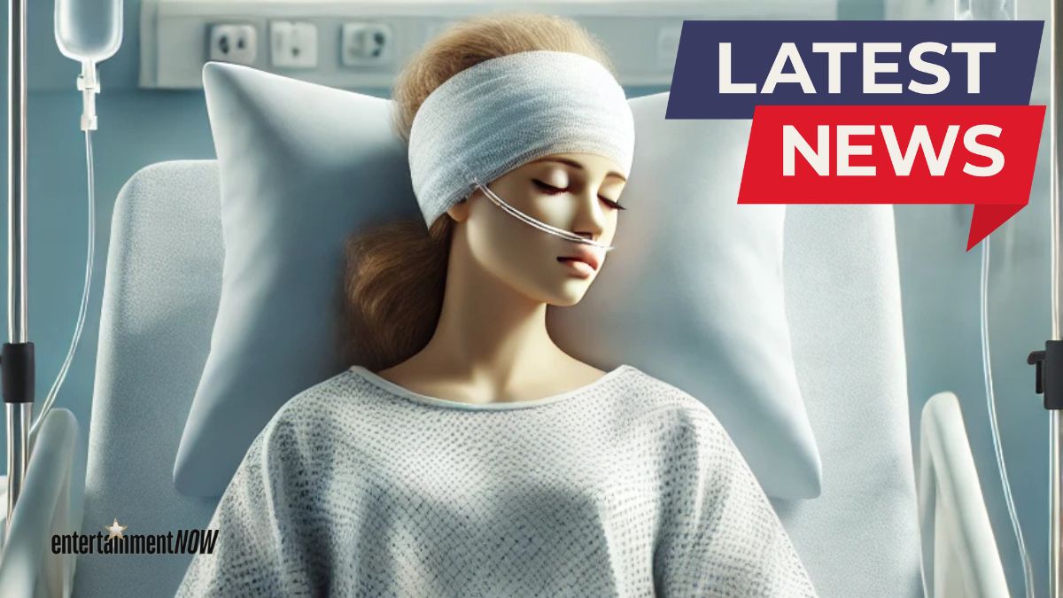 A woman in a hospital bed.