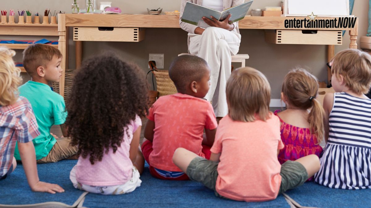 Children listening to a book being read.