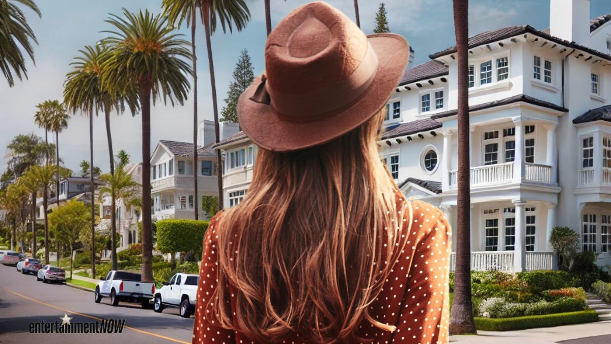 A woman looking at a house.