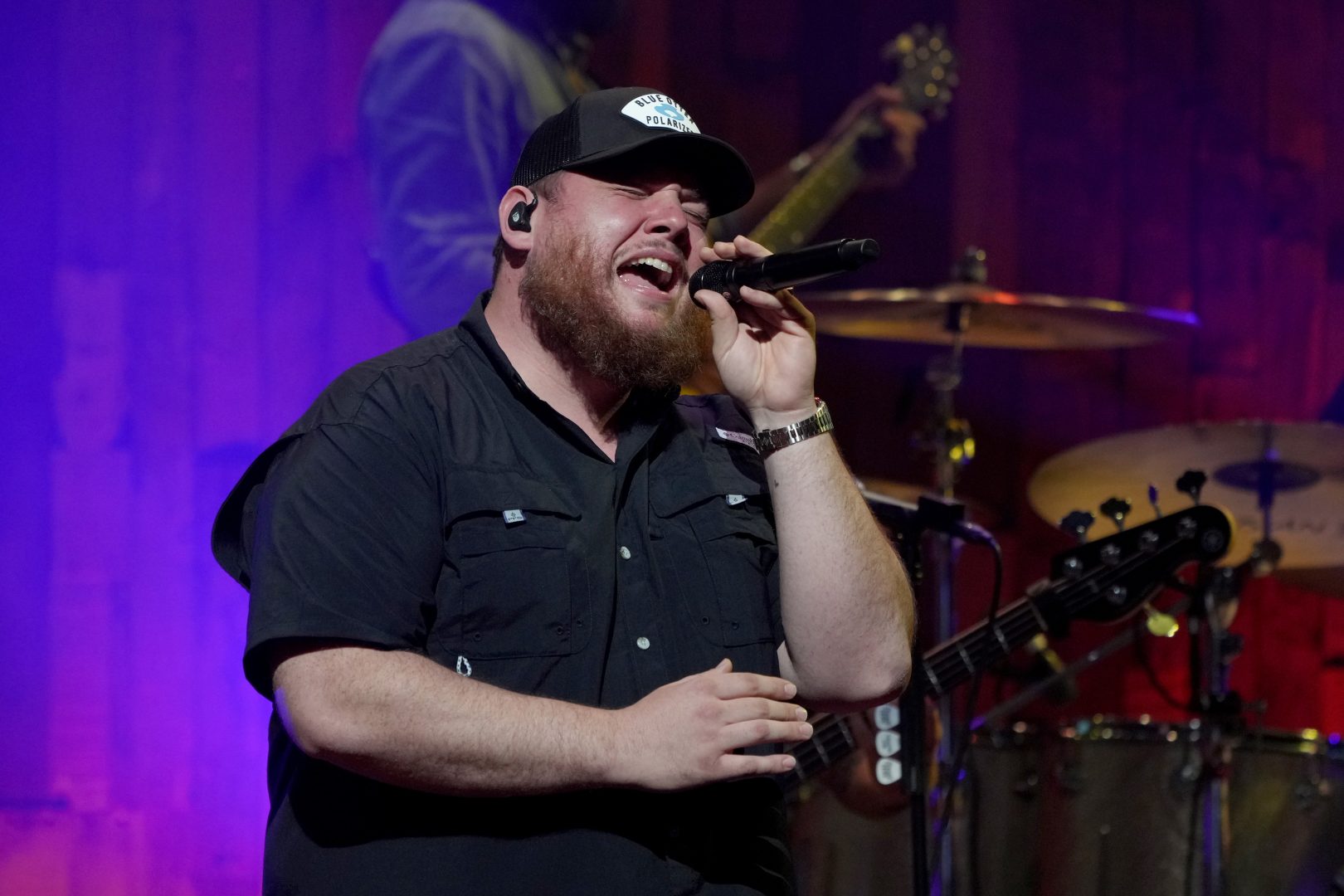 Luke Combs performs onstage