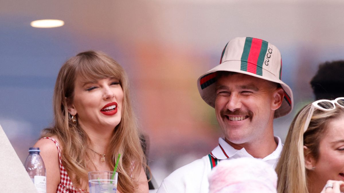 Taylor Swift (L) and boyfriend US NFL football player Travis Kelce attend the men's final match between USA's Taylor Fritz and Italy's Jannik Sinner on day fourteen of the US Open tennis tournament