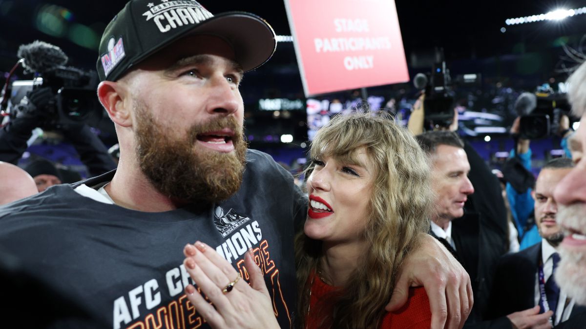Travis Kelce #87 of the Kansas City Chiefs celebrates with Taylor Swift after a 17-10 victory against the Baltimore Ravens in the AFC Championship Game