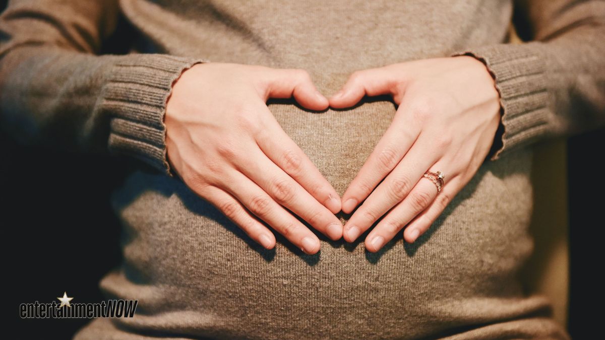 An expecting mother.