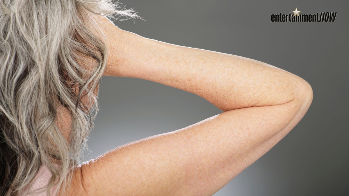 A woman with grey hair.