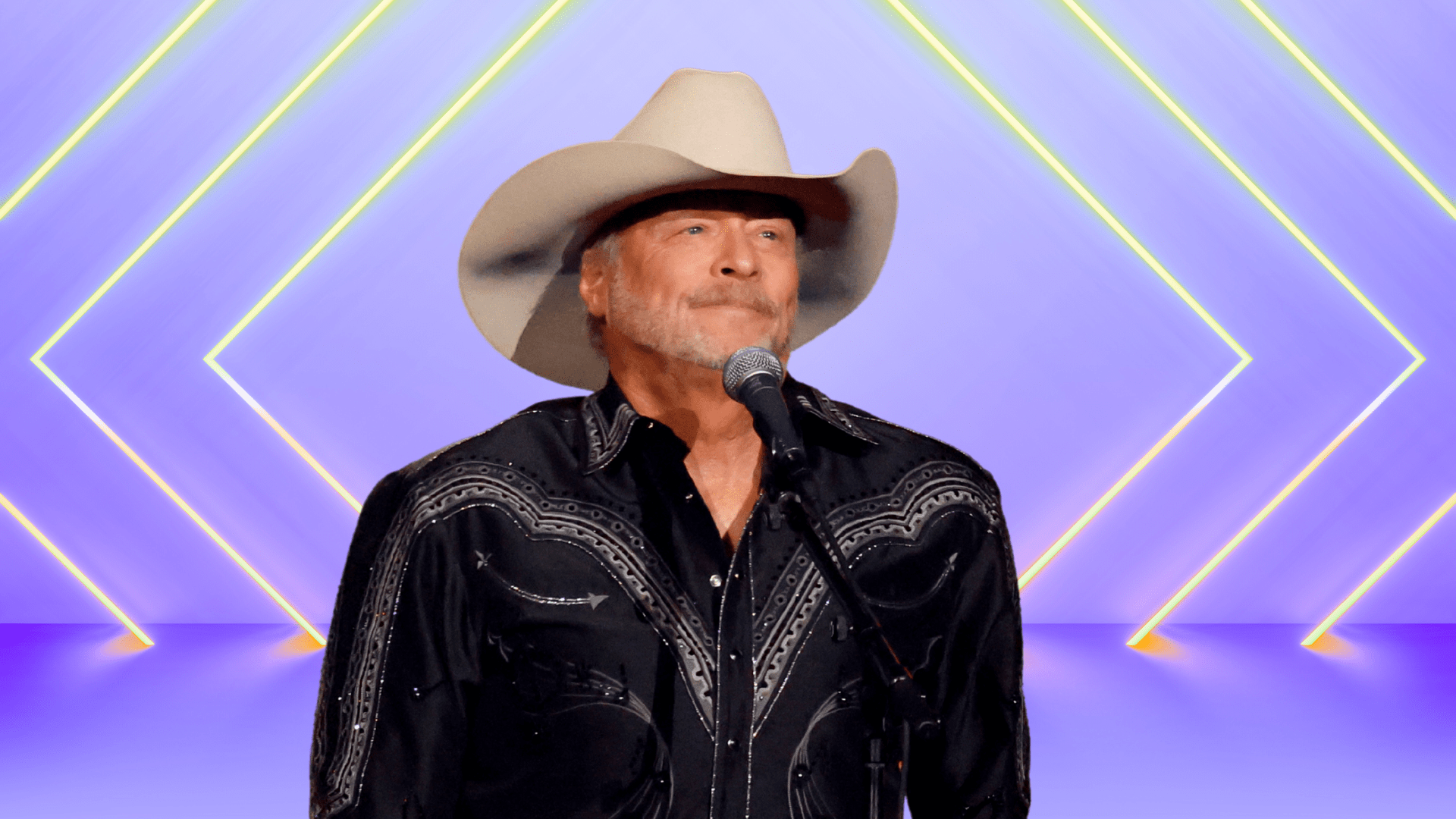 Alan Jackson behind a microphone