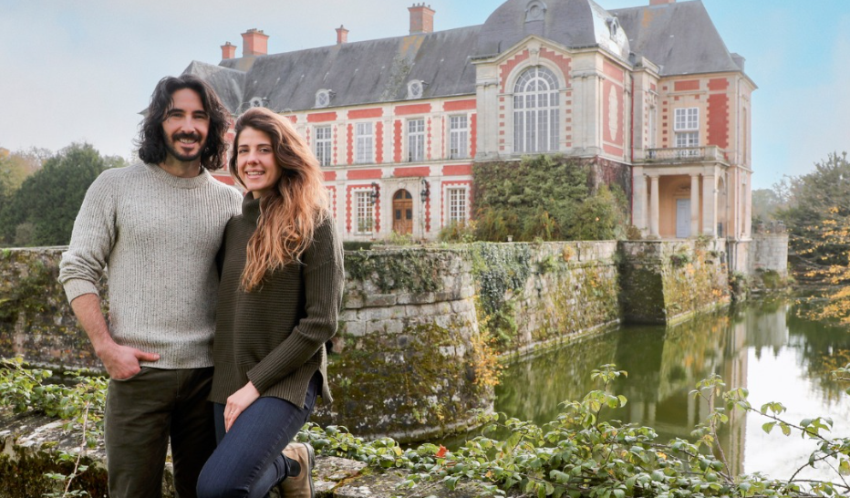 "Castle Impossible" stars posing outside of their French chateau