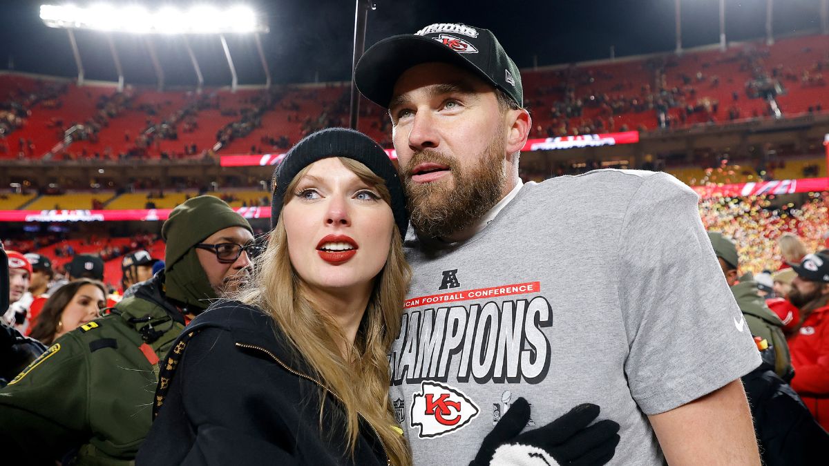 Taylor Swift celebrates with Travis Kelce #87 of the Kansas City Chiefs after defeating the Buffalo Bills 32-29 in the AFC Championship Game at GEHA Field at Arrowhead Stadium on January 26, 2025 in Kansas City, Missouri