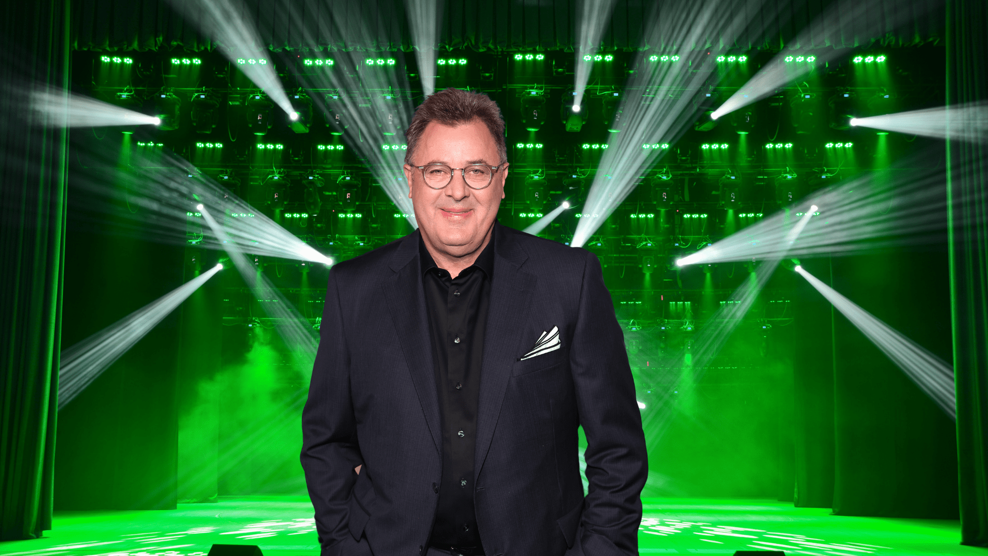 Vince Gill posing on a stage