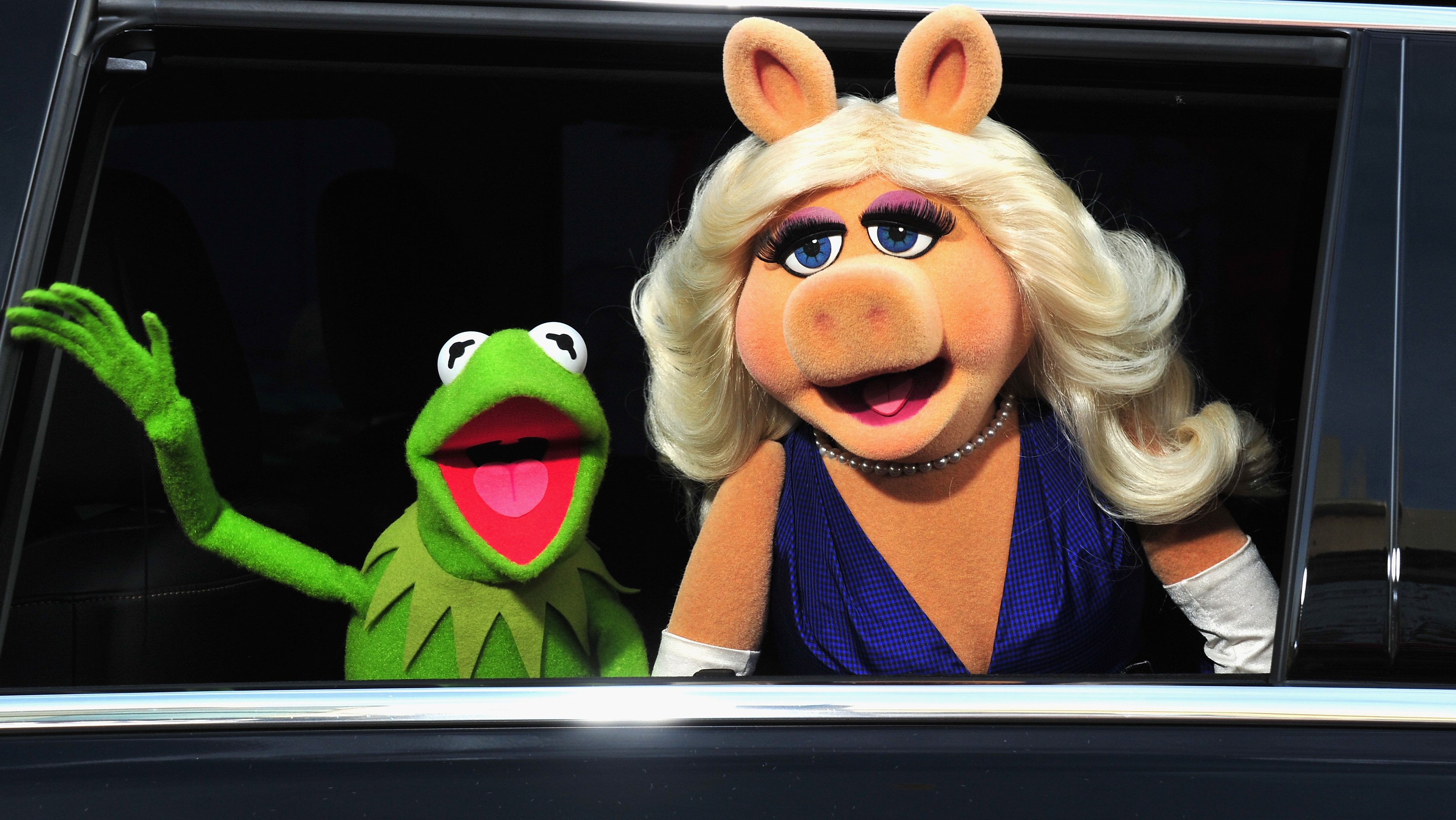 Kermit and Miss Piggy at the premiere of Disney's "Muppets Most Wanted" in 2014