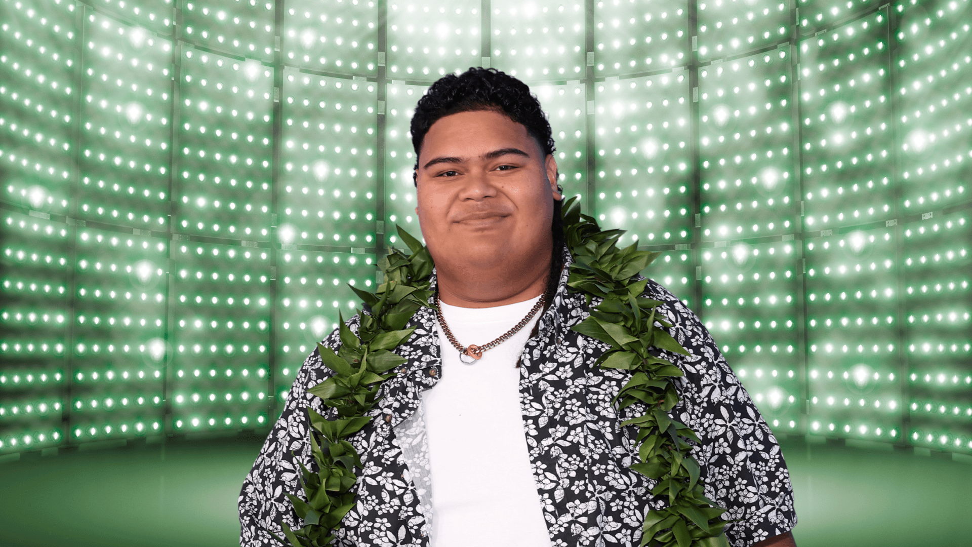 Iam Tongi posing on stage