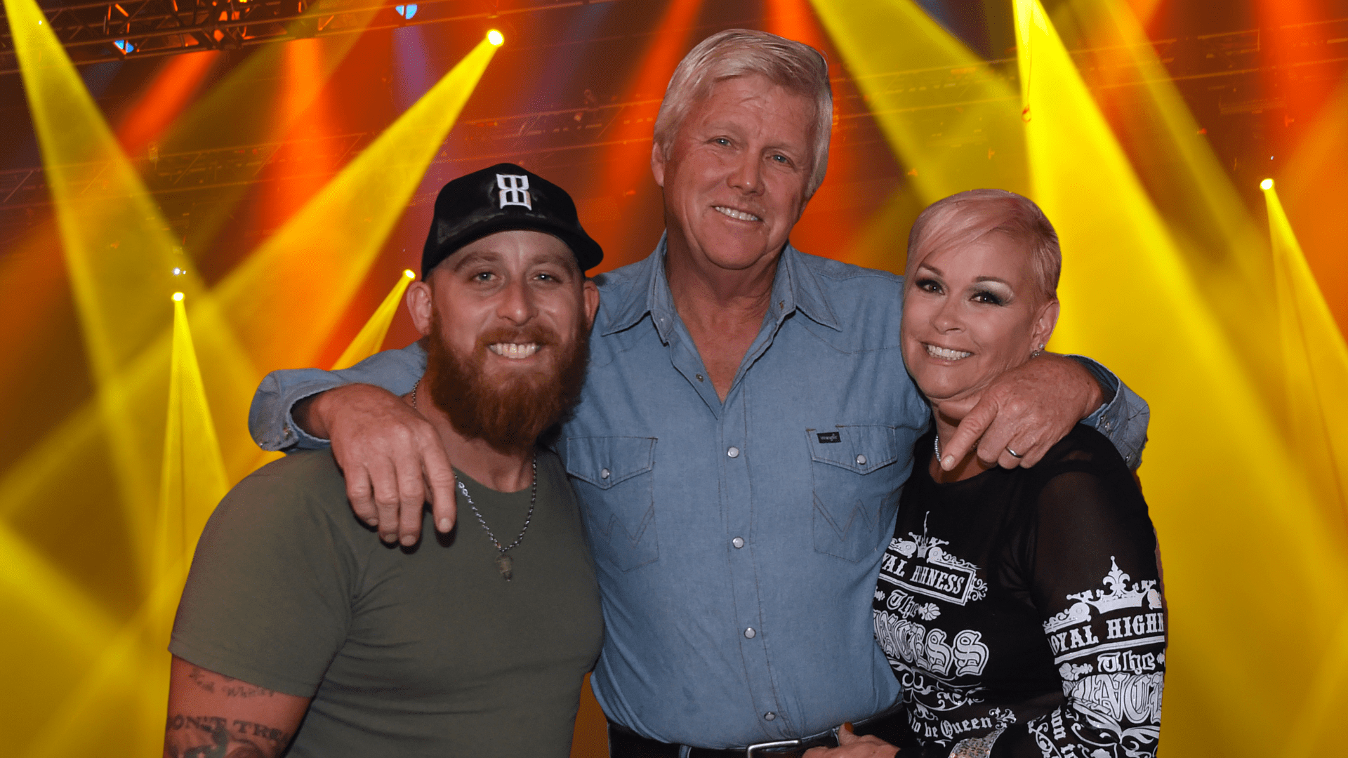 Jesse Keith Whitley posing with his mother and stepfather