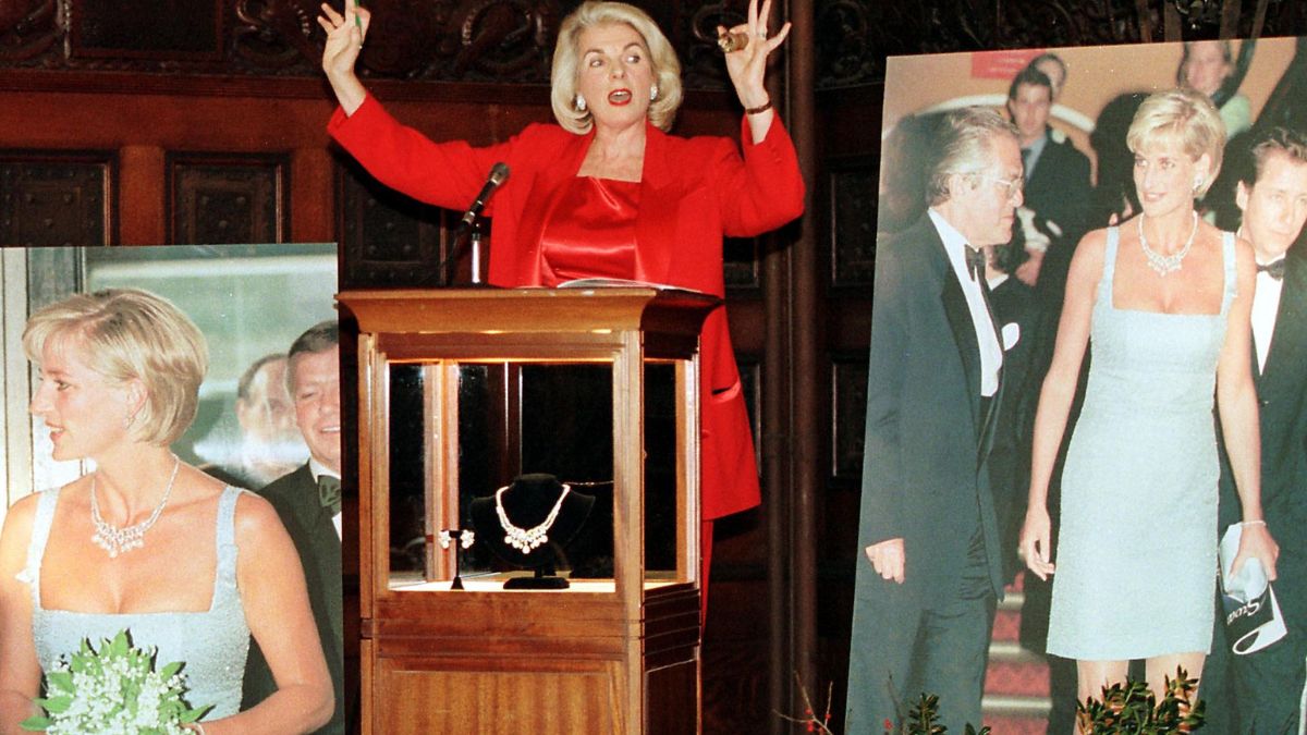Auctioneer Lorna Kelley of Guernsey's gives fair warning for final bids before dropping the gavel on the sale of the Diana, Princess of Wales Swan Lake Suite necklace and earrings 16 December, 1999 at the Armory in New York, NY
