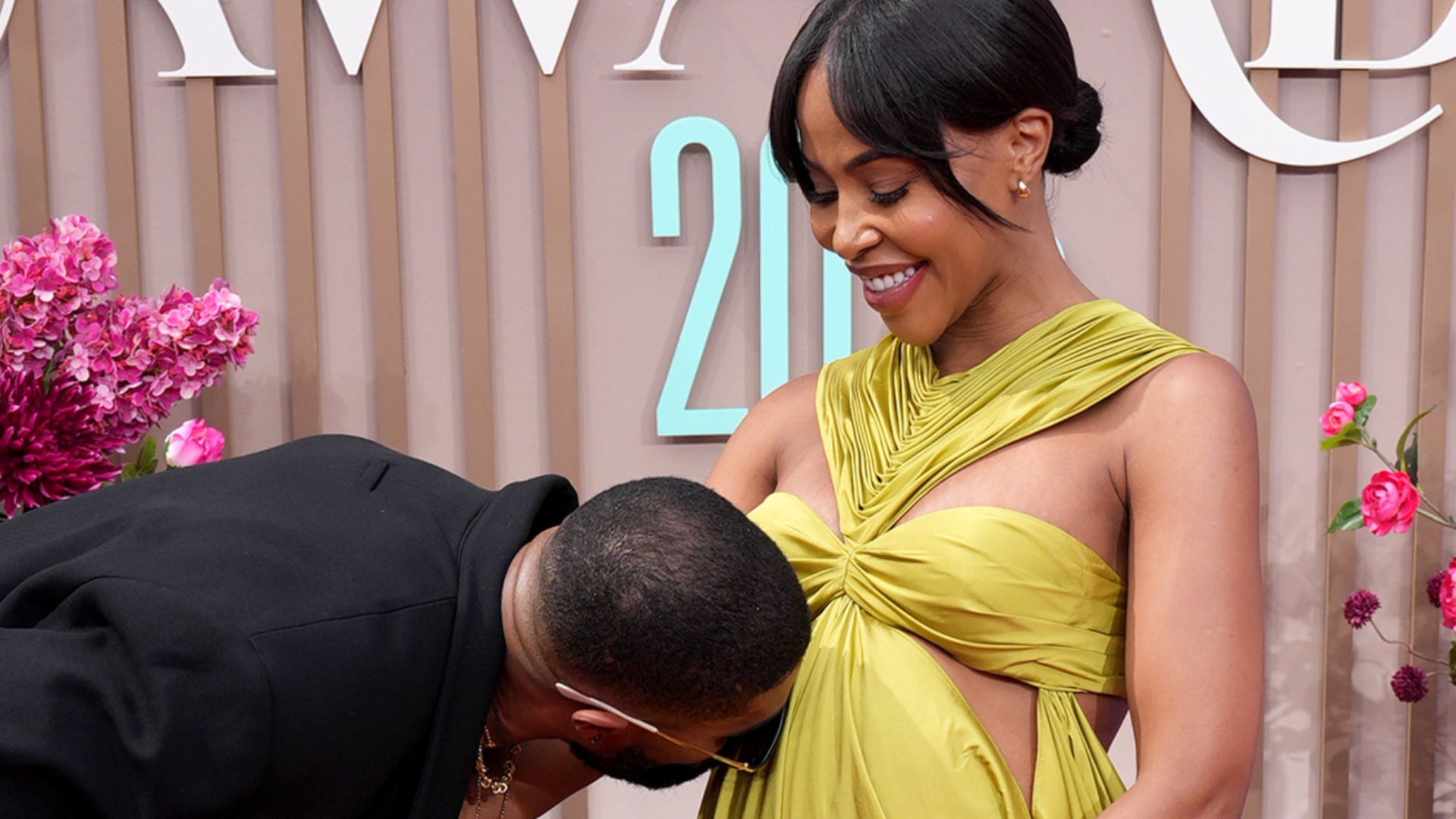 Skyh Black kisses KJ Smith's baby bump