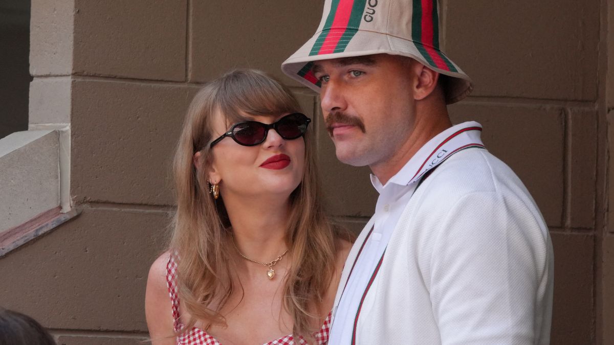 Taylor Swift (L) and US NFL football player Travis Kelce (R) attend the men's final match between Italy's Jannik Sinner and USA's Taylor Fritz on day fourteen of the US Open tennis tournament at the USTA Billie Jean King National Tennis Center in New York City, on September 8, 2024