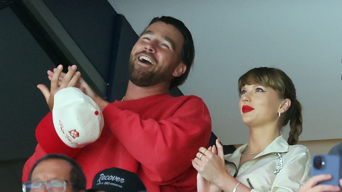 Travis Kelce, left, and Taylor Swift react as the Edmonton Oilers and the Florida Panthers play during the first period in Game Four of the 2025 Stanley Cup Final at Amerant Bank Arena on June 12, 2025
