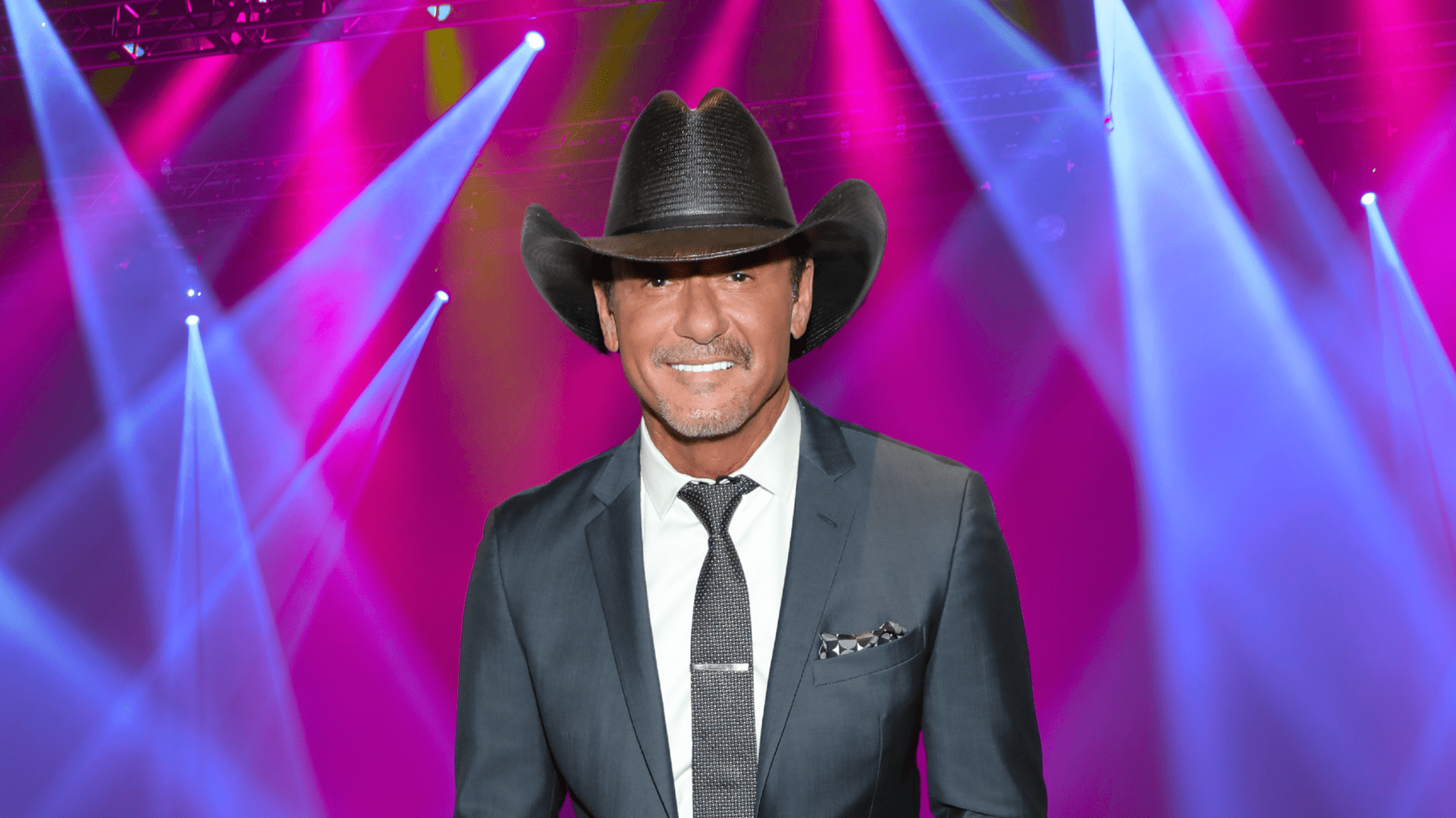 Tim McGraw smiling on stage