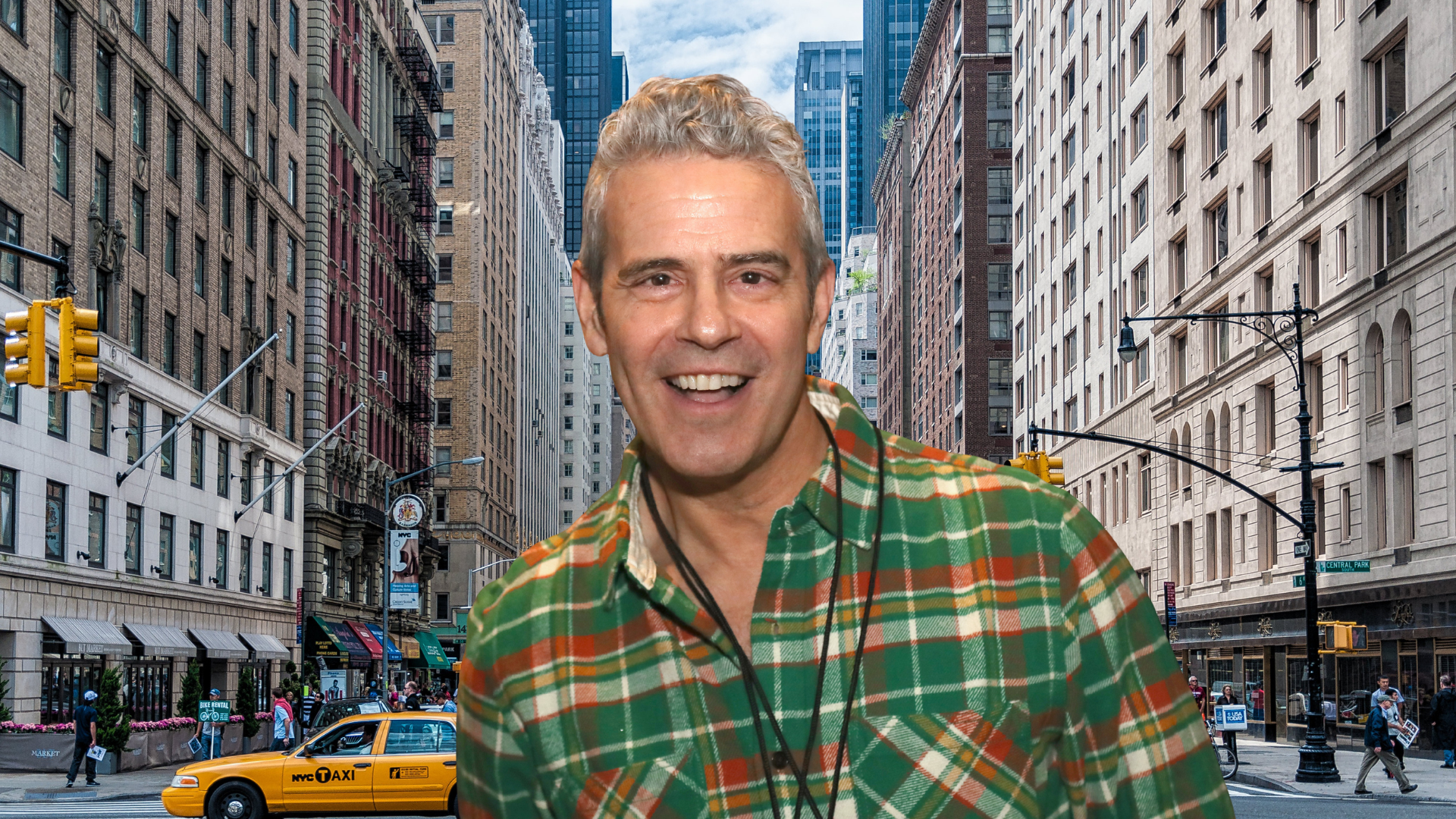 Andy Cohen in front of New York City street.