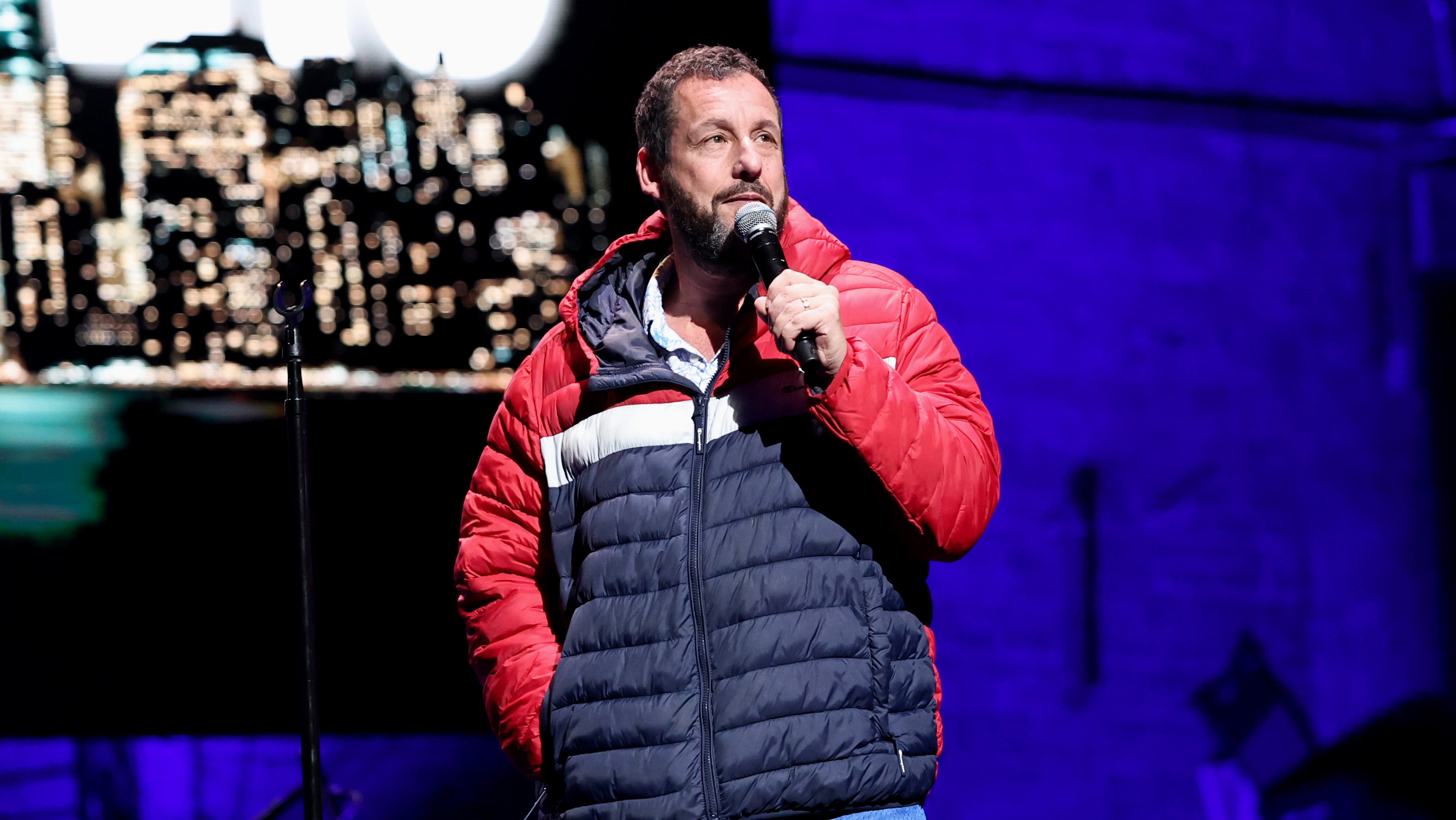 Adam Sandler performs onstage during the 2025 Night of Too Many Stars benefiting NEXT for AUTISM on March 31, 2025 in New York City.