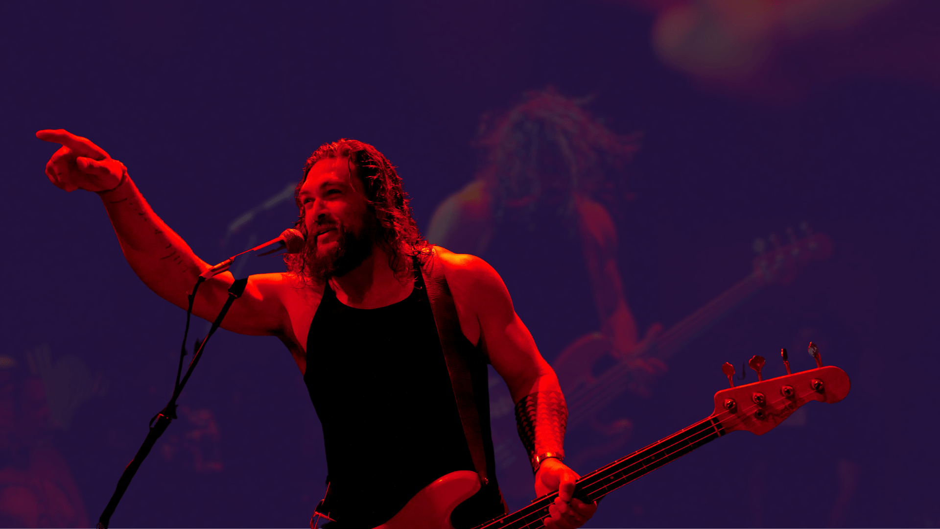 Jason Momoa performing on stage