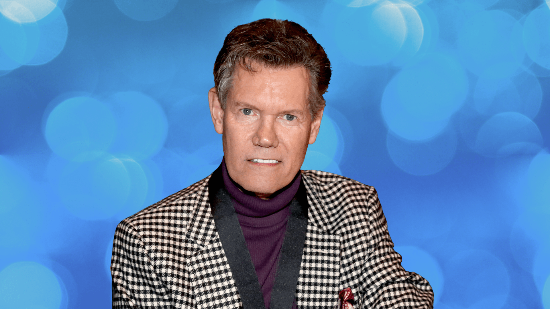 Randy Travis posing for a photo