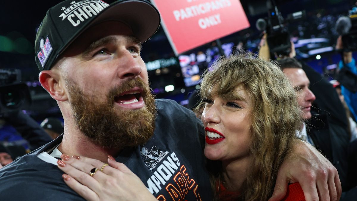 Travis Kelce #87 of the Kansas City Chiefs (L) celebrates with Taylor Swift after defeating the Baltimore Ravens in the AFC Championship Game at M&T Bank Stadium on January 28, 2024