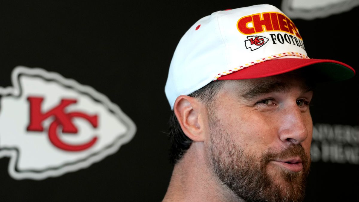 Travis Kelce #87 of the Kansas City Chiefs talks with the media after a mandatory minicamp at The University of Kansas Health System Training Complex on June 18, 2025