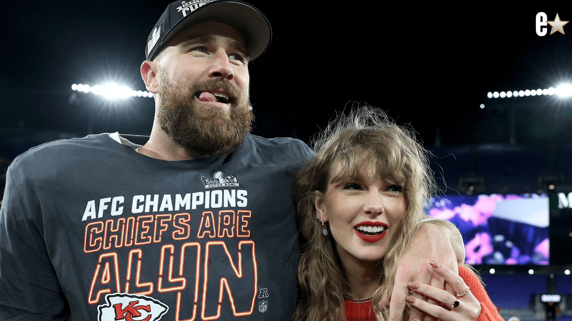 Travis Kelce #87 of the Kansas City Chiefs celebrates with Taylor Swif
