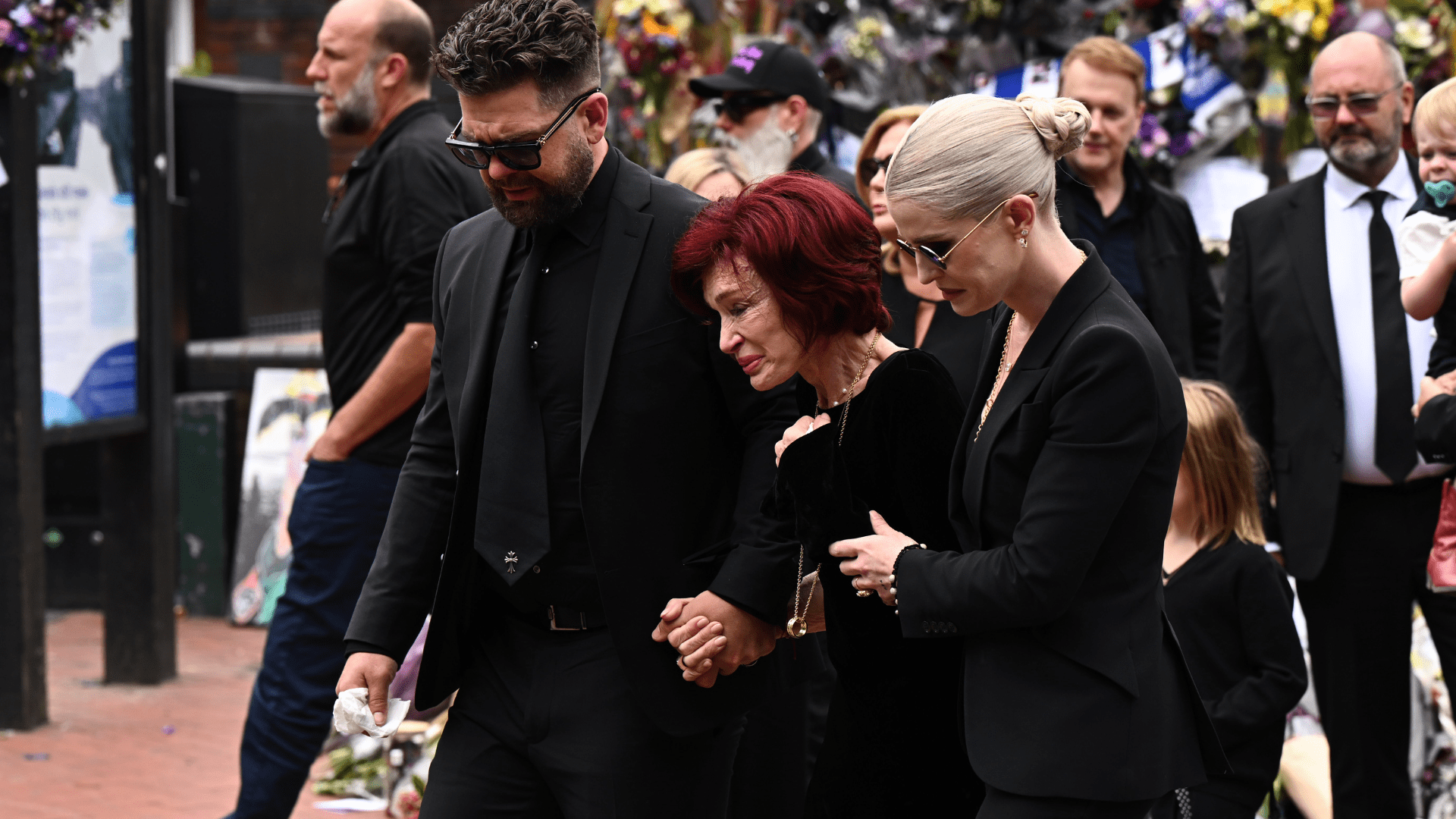 Jack Osbourne, Sharon Osbourne and Kelly Osbourne view tributes to the late Ozzy Osbourne