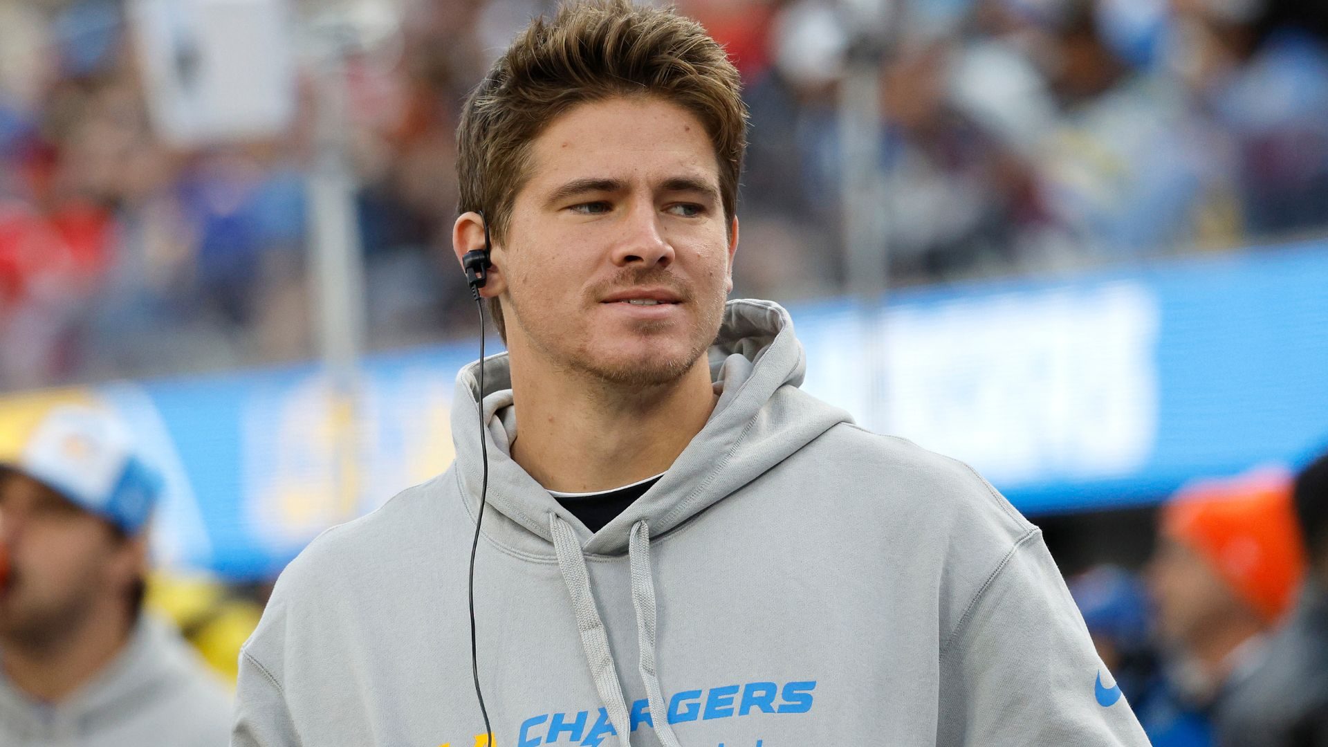 Justin Herbert #10 of the Los Angeles Chargers looks on from the sidelines during a game against the Kansas City Chiefs at SoFi Stadium on January 07, 2024