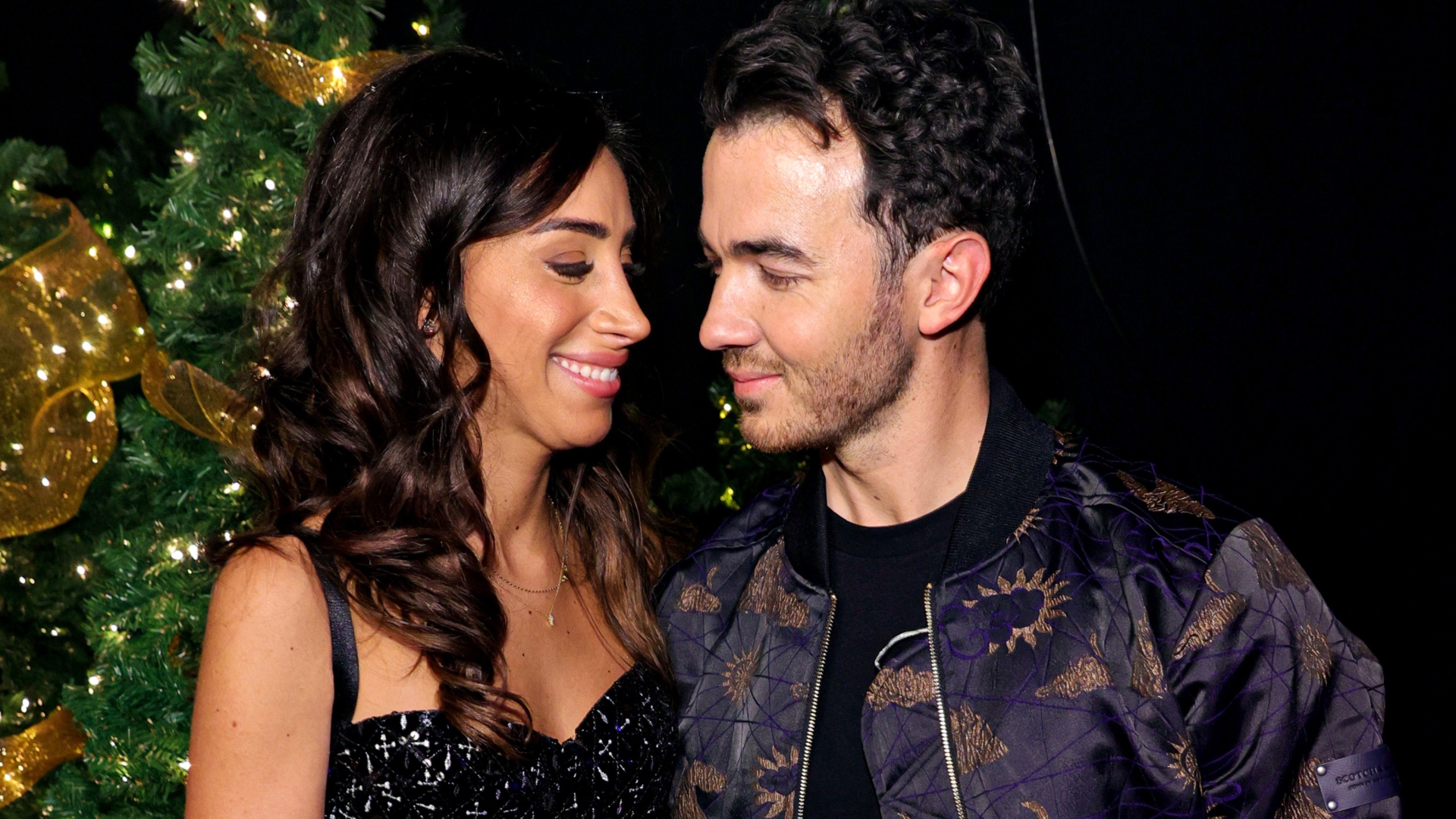 Danielle Jonas and Kevin Jonas smiling