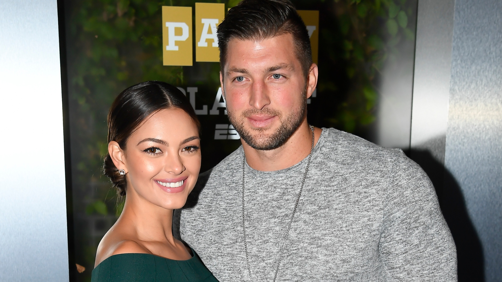 Demi-Leigh Nel-Peters and Tim Tebow pose for photos