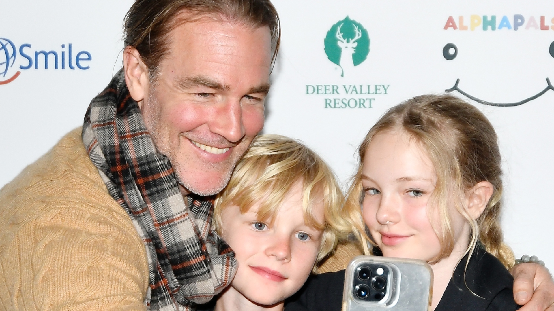 James Van Der Beek poses for photo with his children