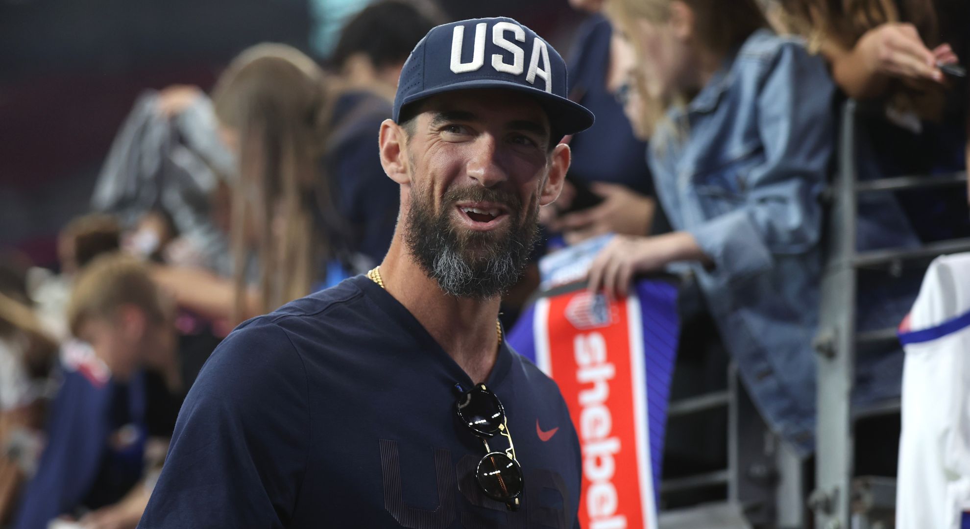 Former U.S. Olympic swimmer Michael Phelps walks down the sideline after the 2025 SheBelieves Cup at State Farm Stadium between the United States and Australia on February 23, 2025