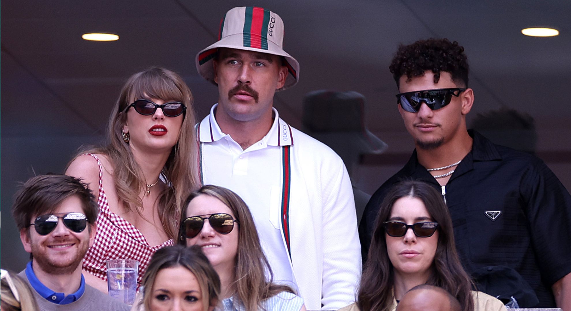Taylor Swift and Travis Kelce and Patrick Mahomes of the Kansas City Chiefs attend the Men's Singles Final match