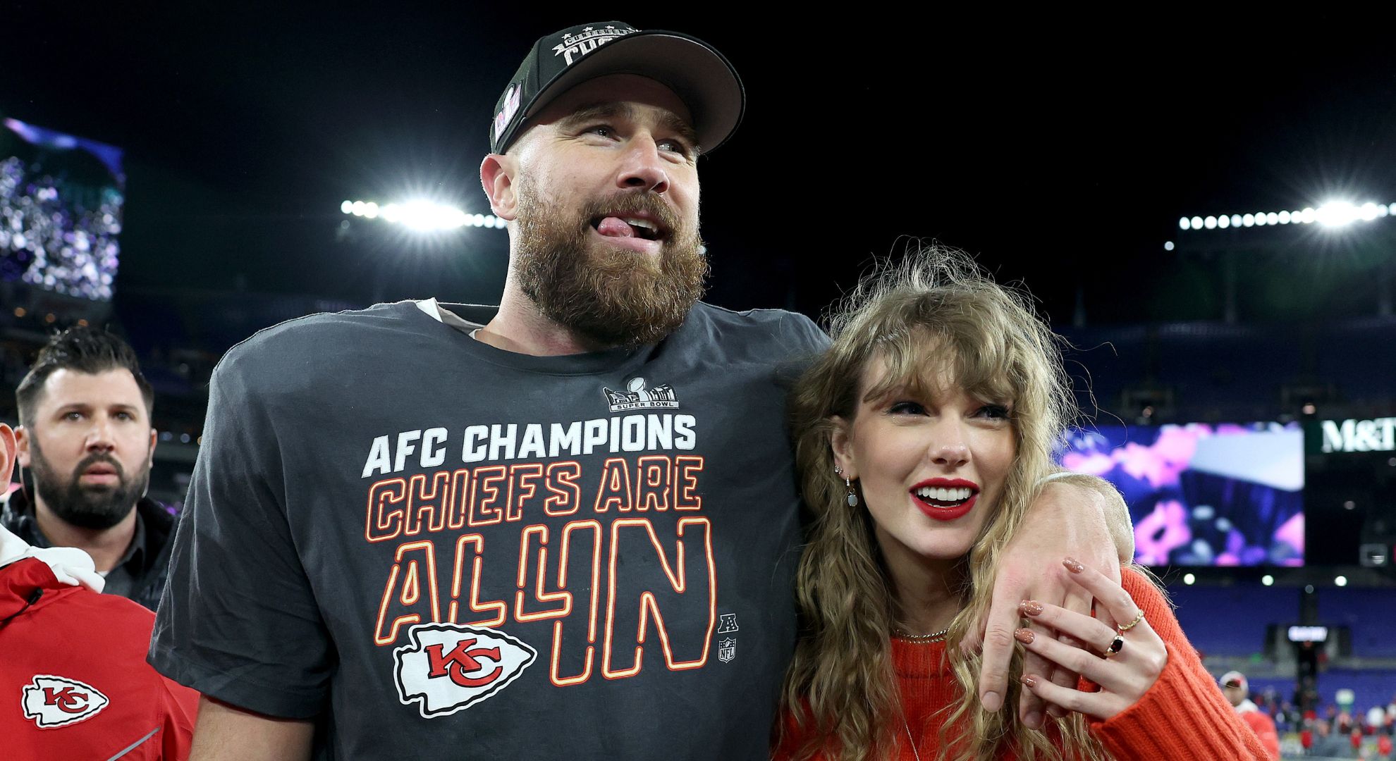 Travis Kelce #87 of the Kansas City Chiefs celebrates with Taylor Swift after a 17-10 victory against the Baltimore Ravens in the AFC Championship Game