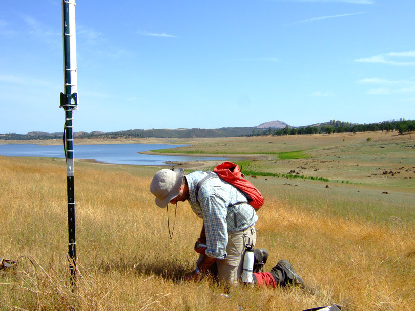 Ruzbeh Akbar installs sensors at a SoilSCAPE site in California