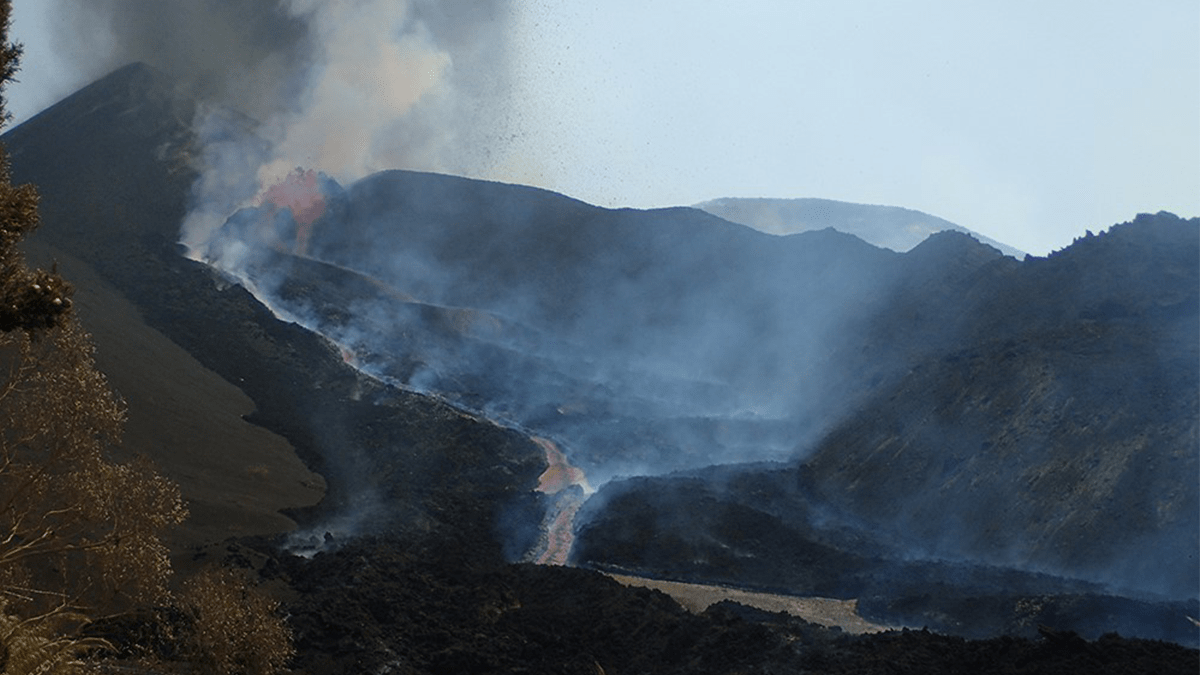 Photograph of a volcano erupting.