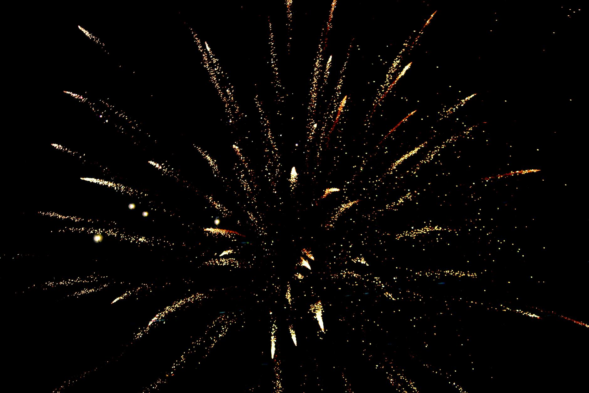 photo of white and brown fireworks