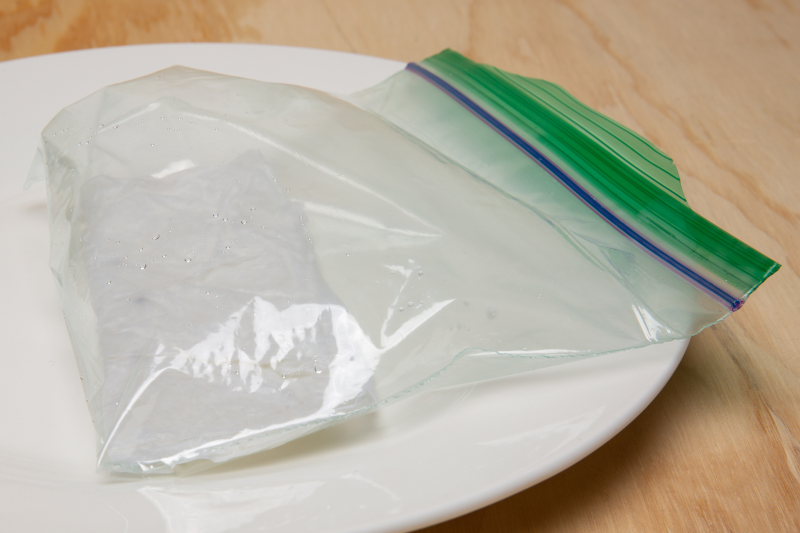 Click to see a larger version of the image germinating cannabis seed with paper towel