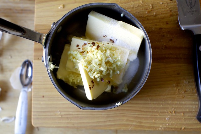 butter, garlic, pepper flakes, salt