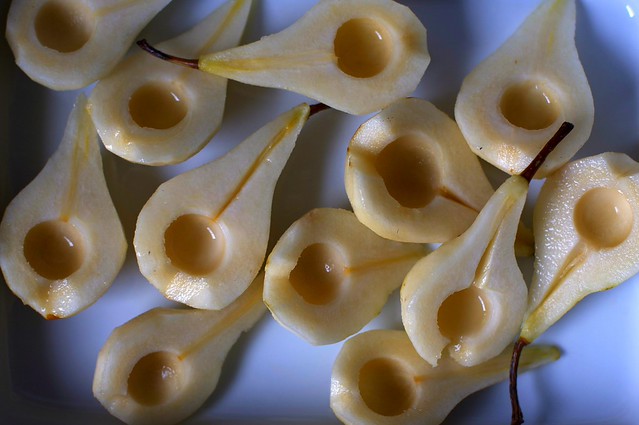 peeled, halved, cored, stems removed