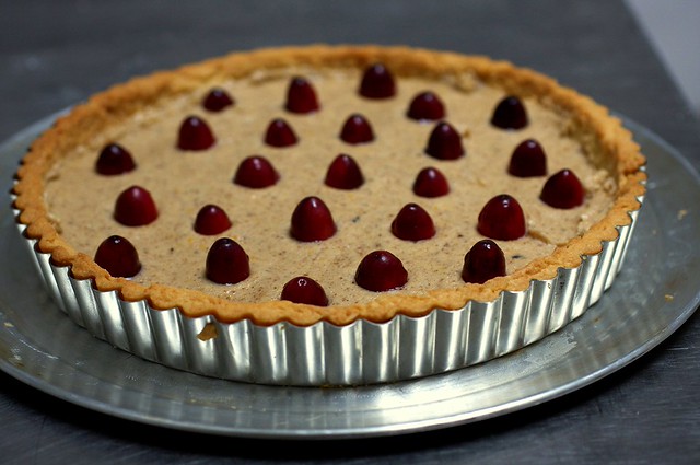 cranberries, floating in frangipane sea