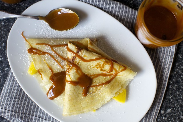 dulce on a crepe with banana and mango