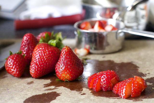 chopping strawberries