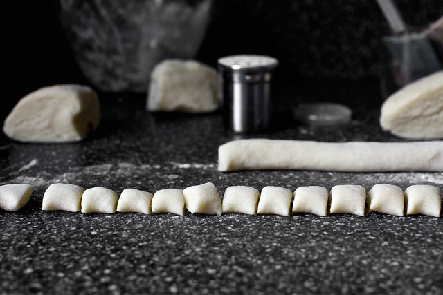 cutting the gnocchi rope into pillows