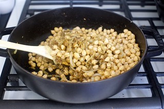 add drained chickpeas, spices, zest