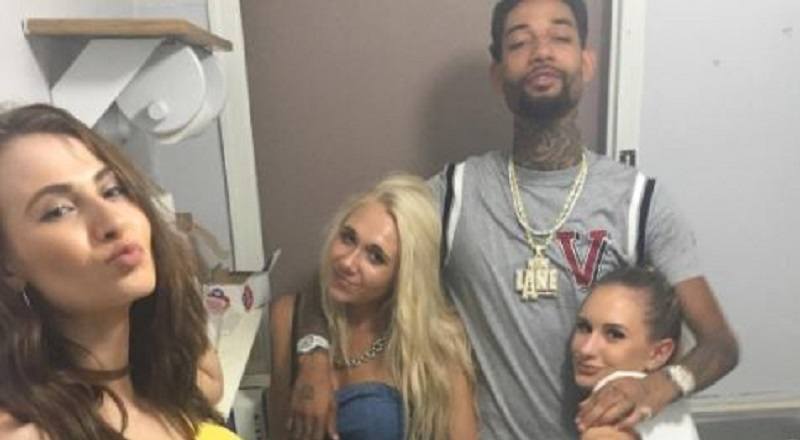 PnB Rock denies the woman took him home, saying he was high at his meet-and-greet in caption of another pic of him with three other women [PHOTO]