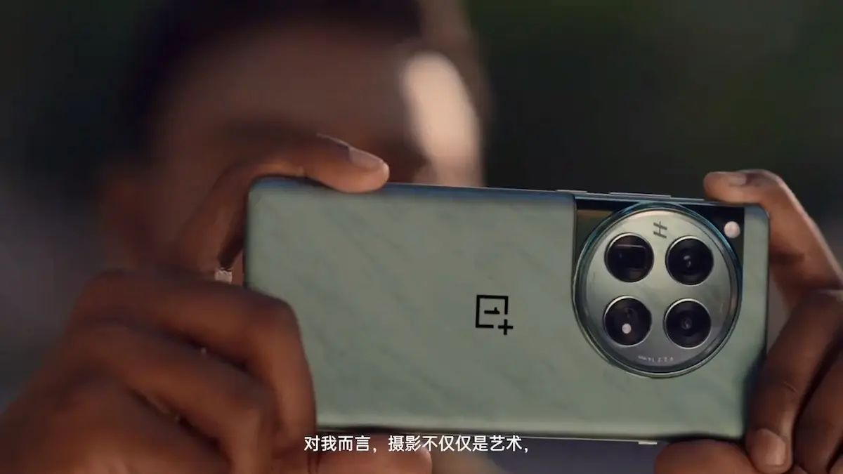 A man holding OnePlus 12 smartphone, in pose of capturing picture